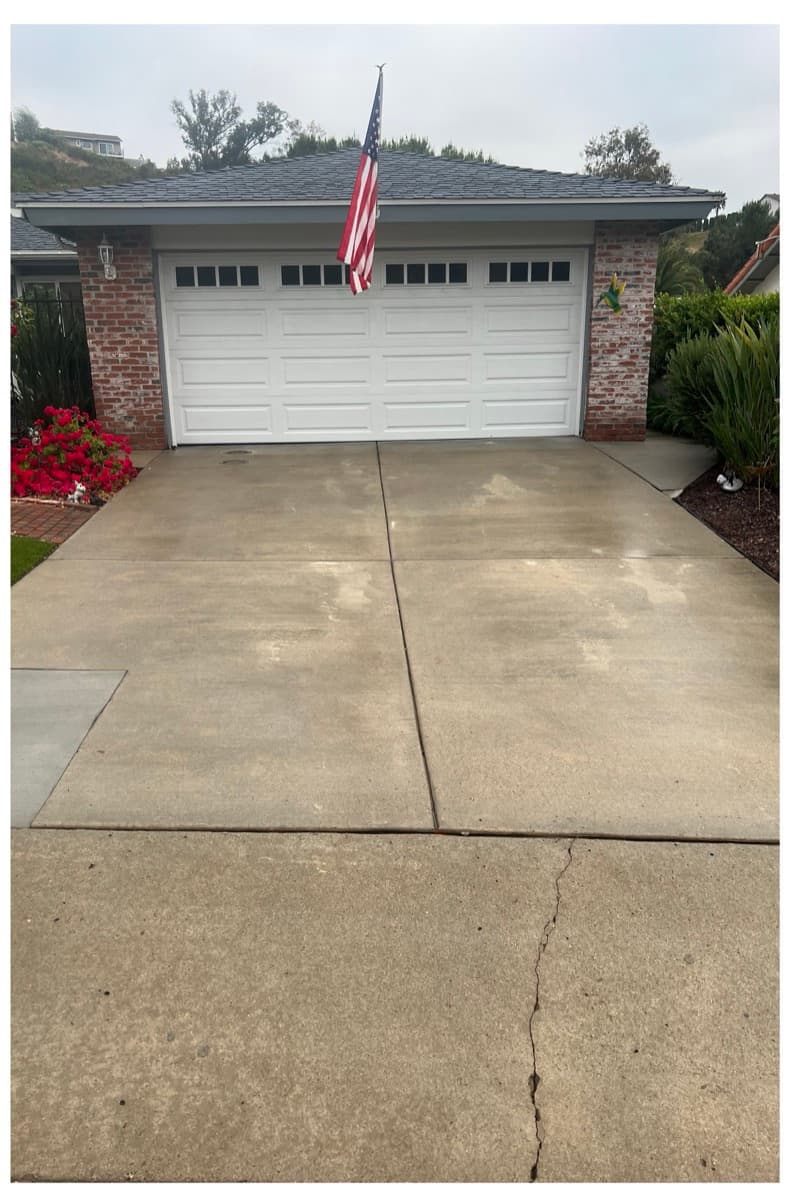 Freshly cleaned two-car concrete driveway